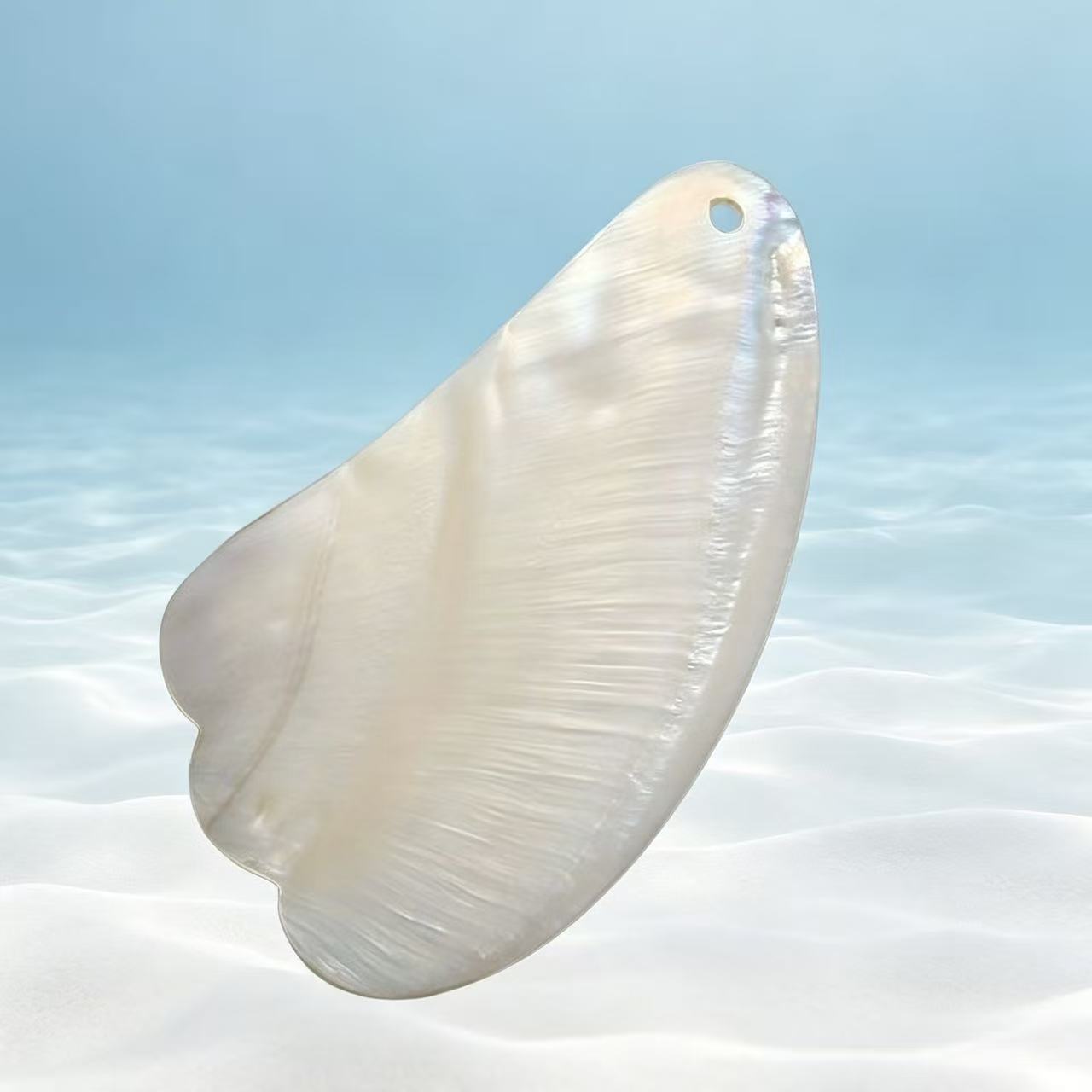 Natural Shell Gua Sha Board – Hand-Carved Facial Massage & Contouring Tool